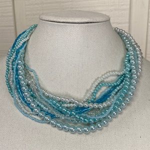 Lovely baby blue torsade style necklace